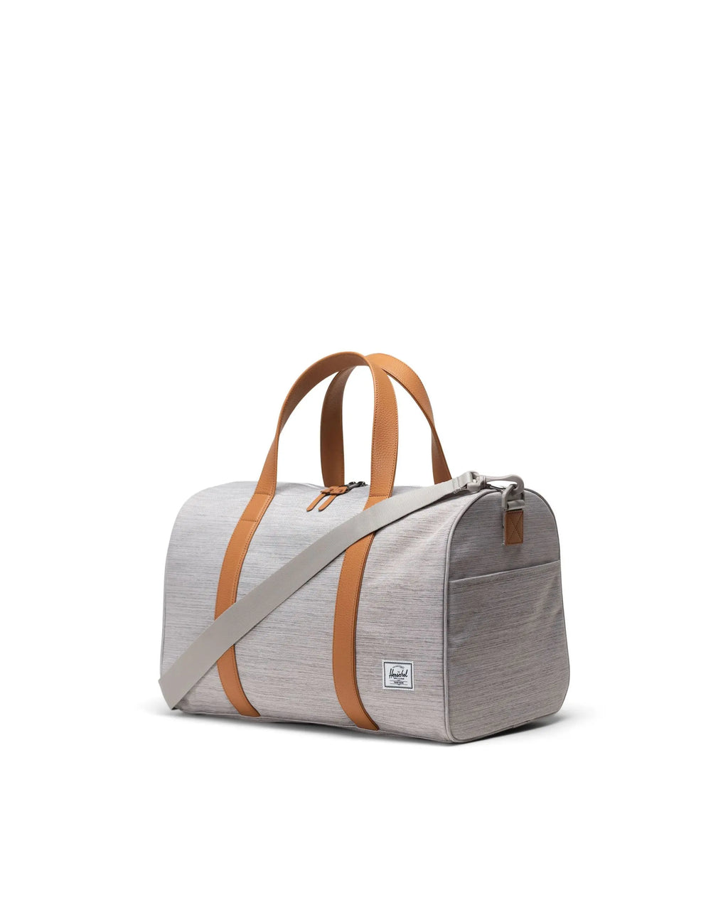 Light heather grey carry on size duffle bag.