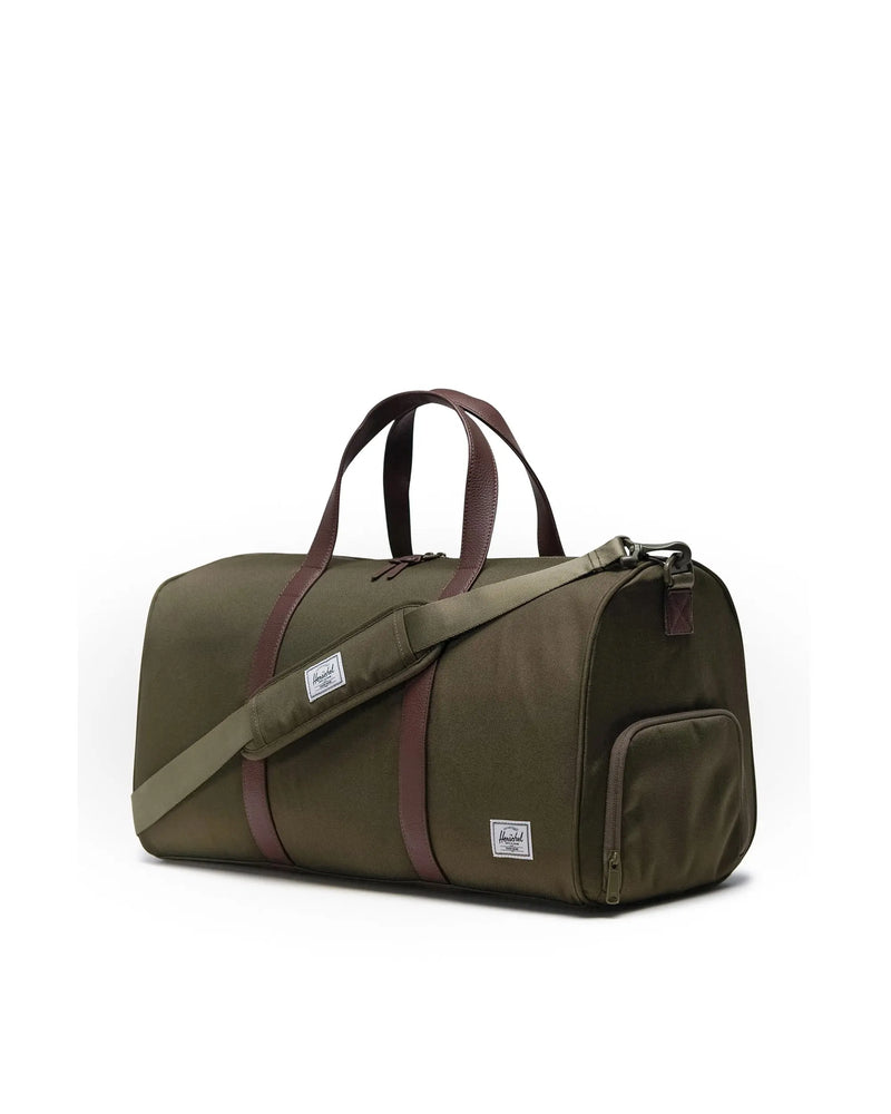 Ivy green 43L duffle bag made from post consumer recycled water bottles.