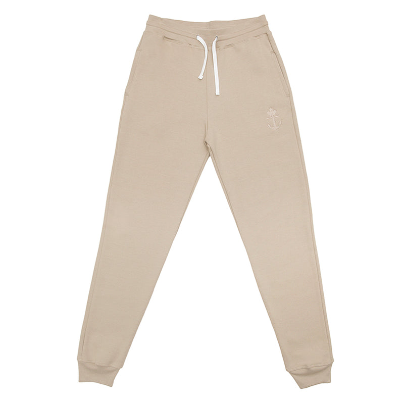 Latte coloured Canadian made joggers. Slim fitting with tone on tone embroidered logo. Polyester/cotton blend